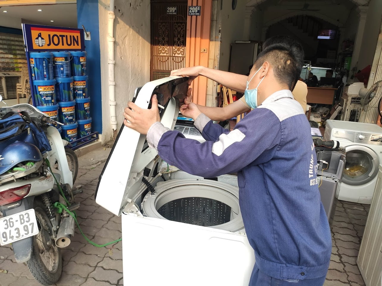 sua-may-giat-gia-lam